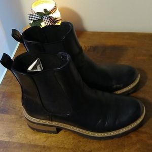 Black boots with inch heal